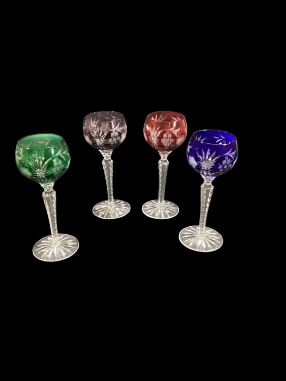 Four Bohemian Cut Wine Hocks: Beautiful cut to clear stems, 7 6/8 inches tall with file cut stems, rayed star bases..emerald green, cobalt, red and,plum