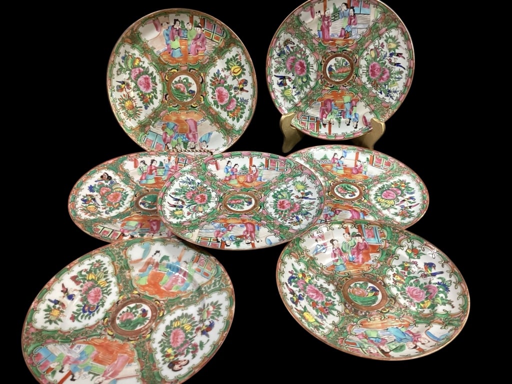 Famille Porcelain Plates: Seven Rose Medallion Porcelain plates. .5 to 9 inches. All with vibrant colors, and panels depicting birds, flowers, figures in courtyard settings. No stamp markings.