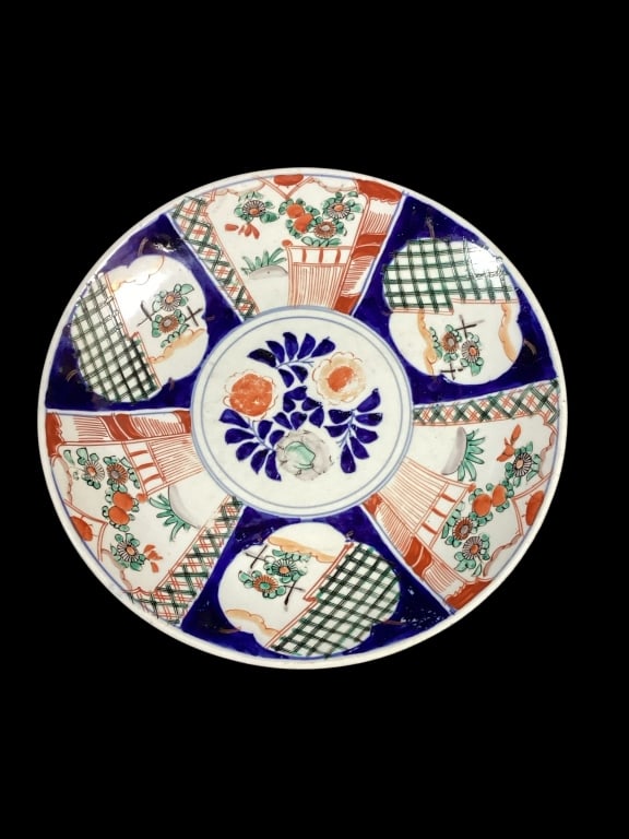 Imari Porcelain Platter: Arita porcelain 24 inch charger, traditional panel decoration with florals, red, blue and green colors. Reverse rim with cobalt flying bats, dry foot ring