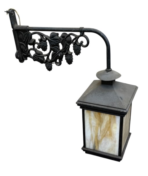 Iron & Slag Glass Lantern: Ornate iron arm, 4 slag glass panels, 34 tall 32 deep the light is 13 x 13 x 20