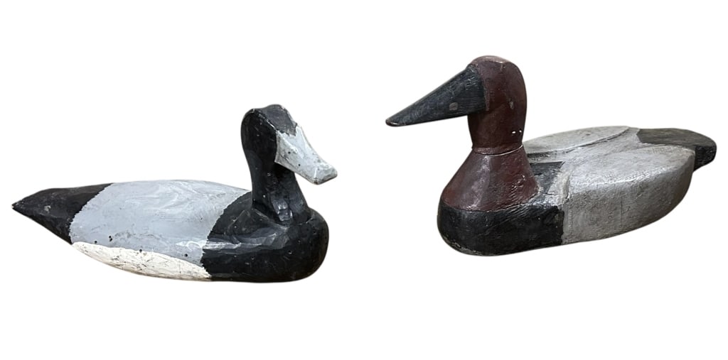2 Louisiana Carved Duck Decoys: Carved and painted decoys, each with identifying labels, including: Scaup (Dos Gris) by Anthony Matherne of Galliano, Louisiana; Drake Canvasback by Kermit Kraemer of Kraemer, Louisiana..age related w