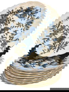 Nine Royal Worcester Porcelain Plates: 9.25 inch plates, mid to late 19th century, assorted blue florals on cream ground, scalloped rims with gilt edges, marks on back..surface scratches from storage and use, few rim chips, gilt loss