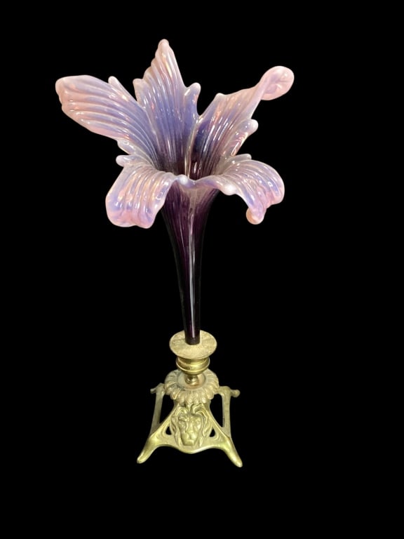 Art Glass Lily Stem: Lovely 12 inch Art glass lily in shaded lavender to pink with realistic folded petals, terminating in a bronze base with Lion mask feature. The base is markedGF Schultz