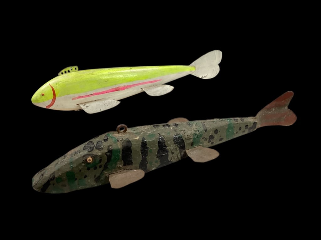 Two Vintage Fish Decoys: Folk Art hand crafted decoys, primarily used for ice fishing, each unique in detail. 1-ten inch slope nose Muskie, great color paint, metal fins made from old tin advertising, pin head eyes, lead bell