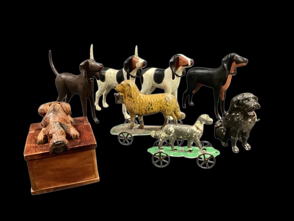 Collection of Dogs: 8 Whimsical Pups of various style. Folk Art carved Fox hounds, cast iron dog seated with a wire hook possibly a key holder or desk article, 6 inch and 4 inch long, tin lithograph pull toys, both attri