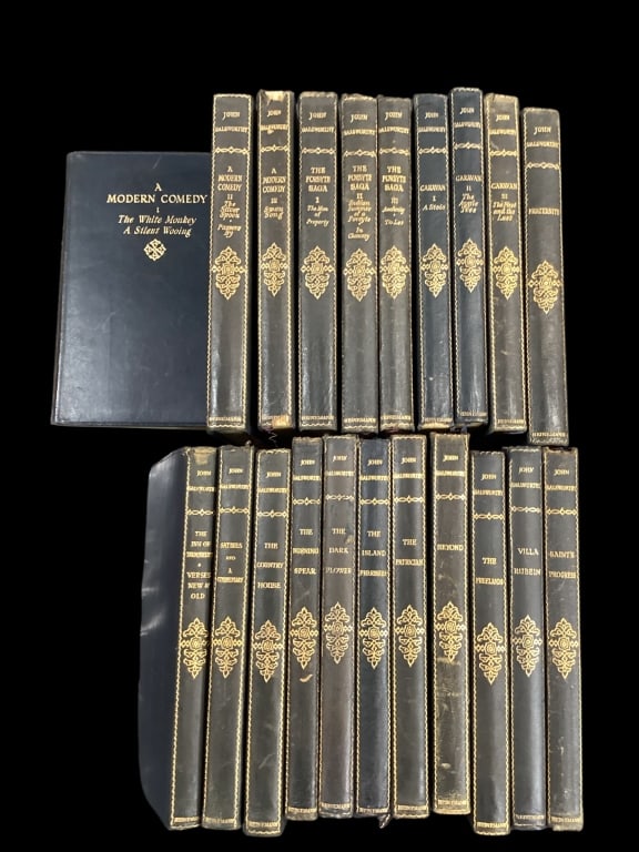 21 Leather Bound Volumes: The Works of John Galsworthy, Grove Editions, 1927 publications. Blue leather binding, 7 x 4.5 inches, gold stamped spines.printed in Great Brittian. * light rubbing, spine bumps, Line Item # 13