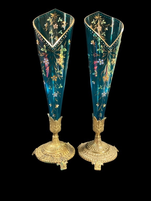 Pair French Art Glass Vases: Victorian Aesthetic with delicate hand painted trumpet vases, deep teal glass with floral and gilt decorated bodies. Circular ormolu base, 12 inches tall
