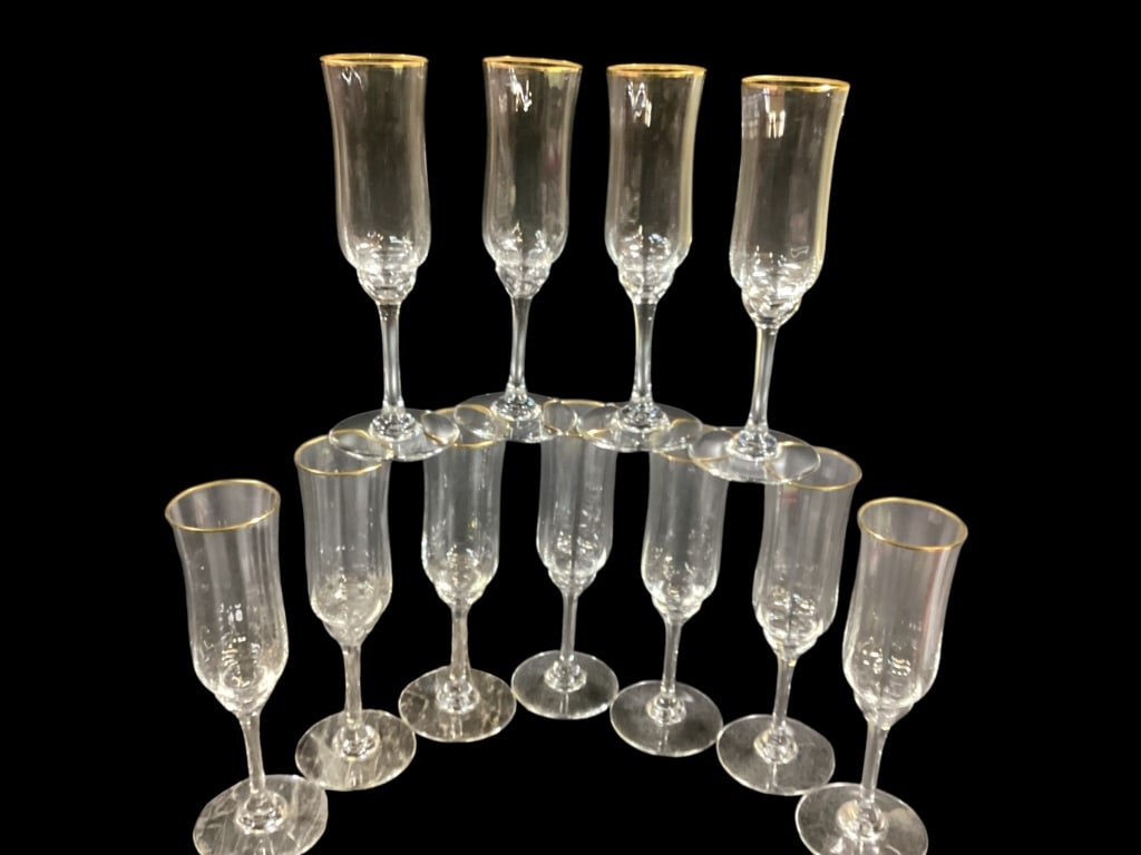Baccarat Champagne Goblets: Set of 11, gold rimmed Champagne or wine goblets, 7.5 inches tall. Marked