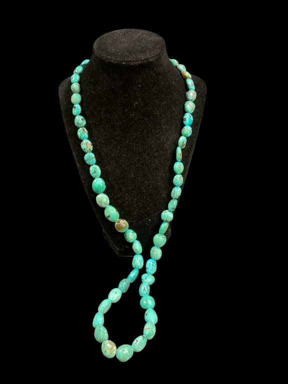 Beautiful Turquoise Stone Bead Necklace: Nugget turquoise stone necklace, at 34 inches in length.