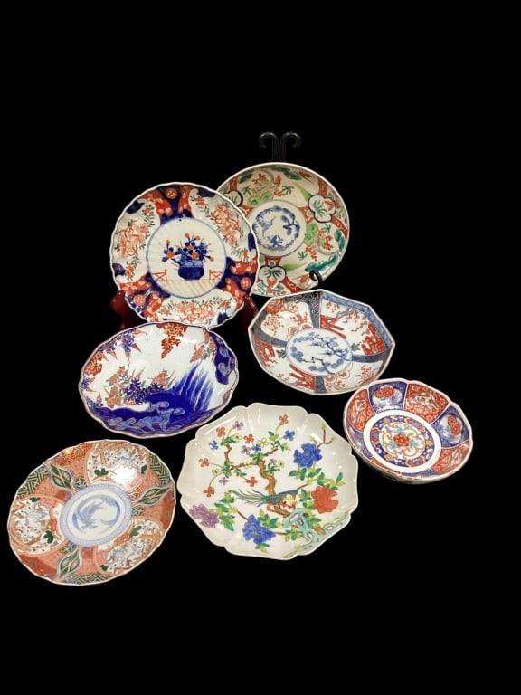 Imari Porcelain: 7 Pieces Japanese Imari Porcelain 6.5 inches tall sculpture footed bowl, 8 inch shallow bowl 4 panel decoration, 7 inch plate Andrea by Sadek, 9 inch plates, one with cloud designs to reverse* one pla