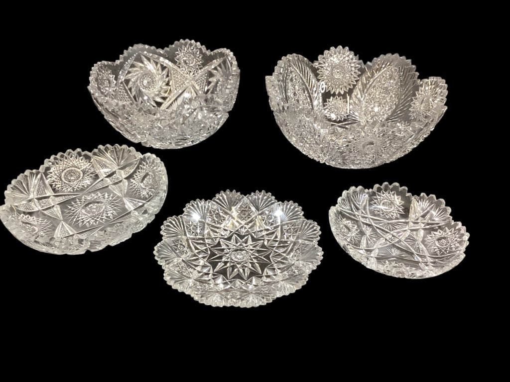Cut Glass Table Objects: Beautiful 10 inch diameter bowl, heavy saw tooth rim, Russian stars with pinwheels, file and feather cuts. 9 inch bowl four point Star base, pinwheels and stars. 8 inch shallow bowl, 6 and 7.5 inch pl