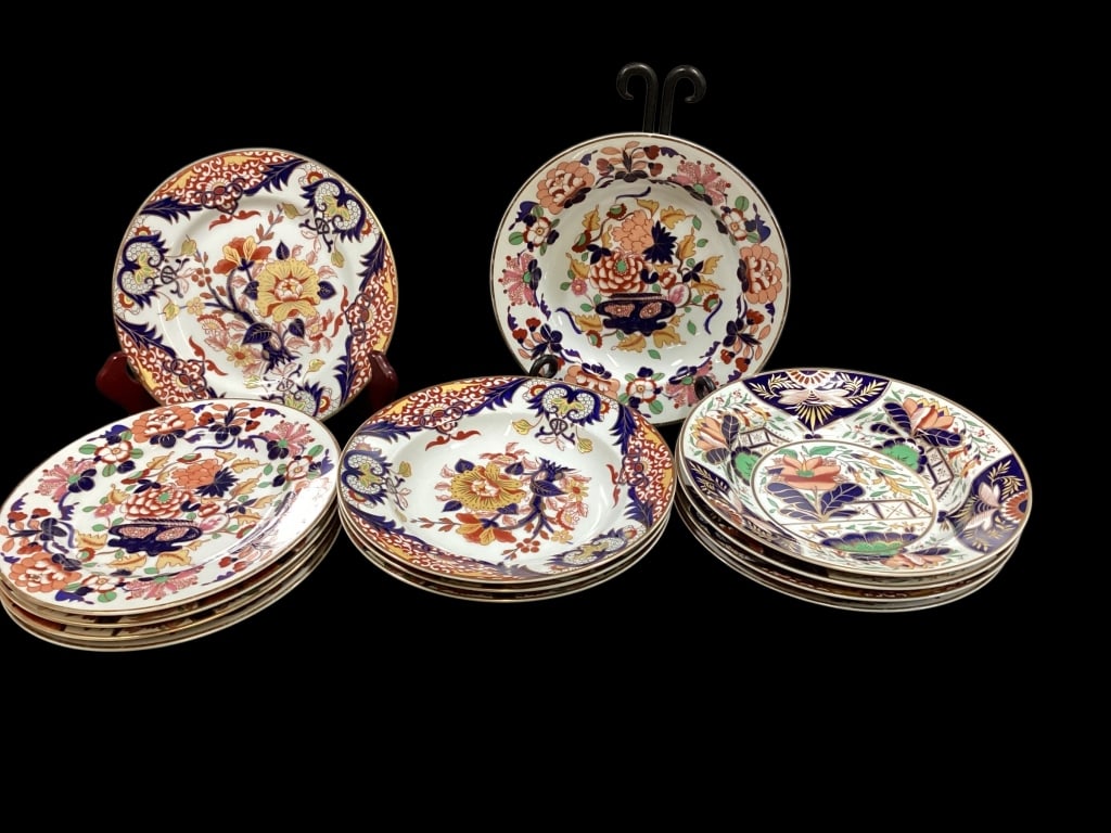Sadek Classic Imari Porcelain: Andrea Classic Imari porcelain. Set of 8 rimmed bowls at 8 1/4 inches, in 4 pattern variations with gold rims. Eight plates at 8 1/4 inch?s diameter. Also with gilt rims. Line Item # 106