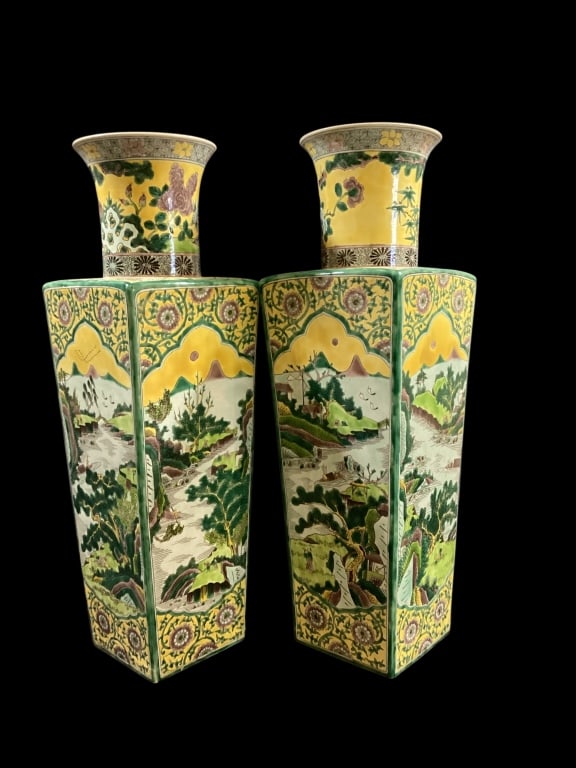 Pair Chinese Famille Verte Vases: Porcelain quadrangle vases, 20 inches tall, characterized by a vibrant color palette of greens and yellows, translucent enamels. Landscape and river scenes. Marked with six character blue marks, indic
