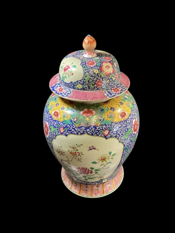Chinese Porcelain Temple Jar: Famille Rose decorated body, 26 inches tall, with bulbous body, warrior helmet lid. With artichoke finial. Double panel cartouche. Peony , butterflies, and floral . * Repaired crack to body