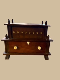 Shaker Sewing Box: Antique walnut sewing box, two tier with lower drawer, bone button knobs, heart shaped escutcheon. Lift top lid reveals 8 spindles for thread, which is fitted thru the bone inlay openings. 9 x 6.5 x 4