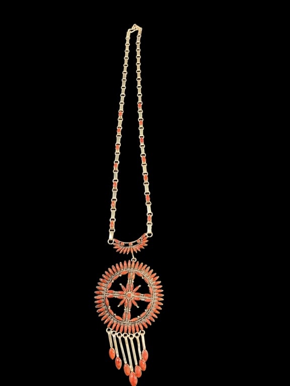 Zuni Sterling and Coral Neclace: 30 inch cluster necklace set with coral cabochans. Silver raindrops, Link chain with center drop. After Lorraine Waatsa design.
