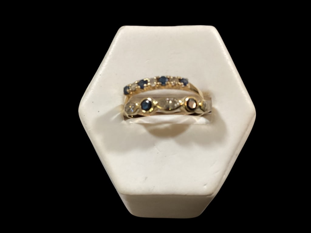 Two 14 K Yellow Gold and Gemstone Bands: Sapphire and Diamond band with 7 stones, size 7: Amethyst ? and diamond 5 stone band, size 8