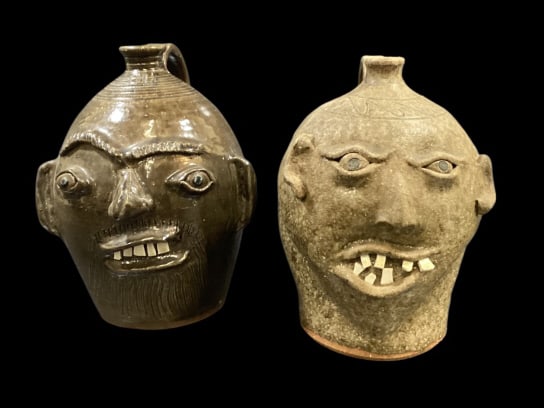 Southern Folk Pottery Ugly Face Jugs: Dewayne Craig ( grandson of Burlon) ugly face jug crooked smile, bug eyes. Over fired with mottled alkaline glazed, signed. Harley Lisk ugly face 12 inch jug, glossy glaze, crooked smile with teeth, b