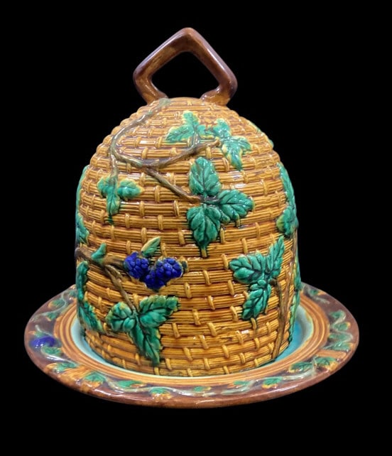 Minton Majolica Beehive Dome: Relief decorated beehive cheese dome and under tray. Leafy foliage with blackberry clusters, The under tray with similar foliage and berries. Turquoise glazed interior, stamped Minton.