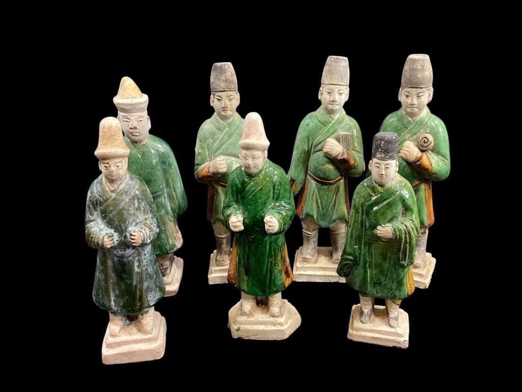 Seven Ming Dynasty Tomb Attendants: Sancai glazed Figures depicting court attendants or sedan chair bearers. 7 to 9 inches.