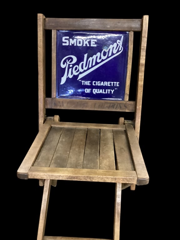 Piedmont Cigarette Advertising Chair: 1920s Folding Wooden slat Advertisement chair with Porcelain two sided Smoke Piedmont The Cigarette of quality..back rest. Save Your Coupons logo stamped at lower slat. 1920?s