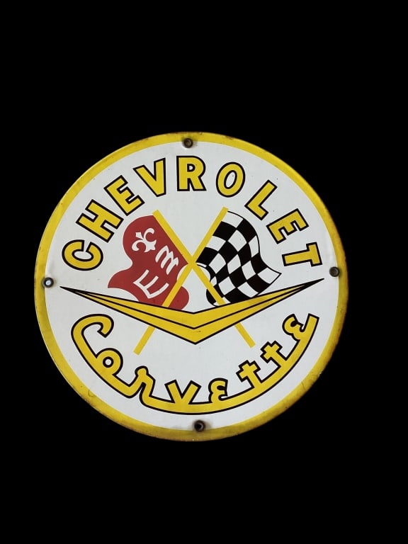Porcelain Chevrolet Corvette Dealer Sign: Logo sign, single sided, good heavy quality measures 12 inch diameter clock. Grommets intact. Good color