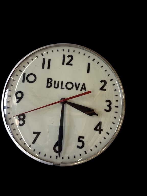 Bulova Light Up Wall Clock: Vintage Bubble glass wall clock, 15 inch diameter, white face, with black Arabic numerals. Silver tone metal frame. Often used in Jewelry stores to Advertise Bulova Watches. Good cord intact
