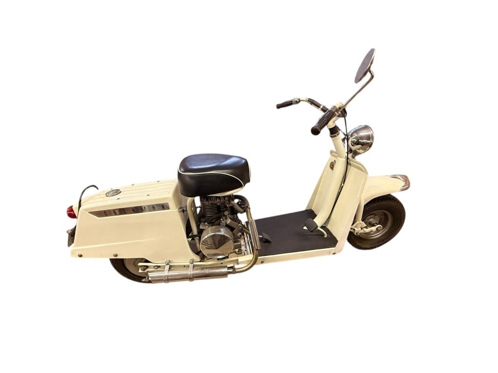 1959 Cushman Highlander: Appears to be mostly original, exhaust looks like it has been replaced : 1957 Cushman Highlander is a highly original example of the classic American "step-through" scooter, finished in an