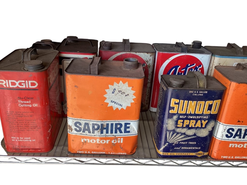 Twelve Advertising Cans, Motor Oil and Others: Most 1 Gallon size, including Sapphire, Sunco Spray, Artex Motor Oul, Gulf, Ridgid, John Deer