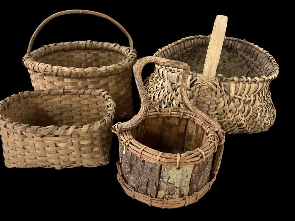 Four Good Country Baskets: Big Butt basket, rib and split woven form, bent wood handle, wrapped rim. 12 inch spliit oak apple basket, carved handle, square to round form, 11 inch split basket ( handle broken off), tree