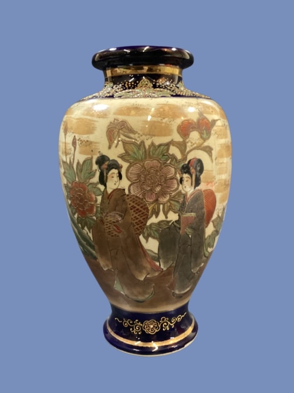Japanese Satauma Vase: Meiji period vase, hand painted polychrome enamel deep cobalt body with Geishas in a garden setting. 12 inch form, double sided panels with glazed rim lip.