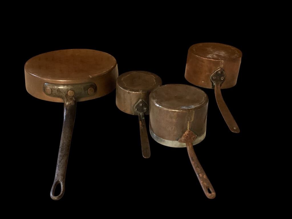 Vintage Copper Cookware: Four Pieces good copper cookware. Large 12 inch skillet, heavy copper with long cast handle, marked Wooster. 8 inch sauce pan with copper handle, 5 and 6 inch sauce pans as same. * normal use wear