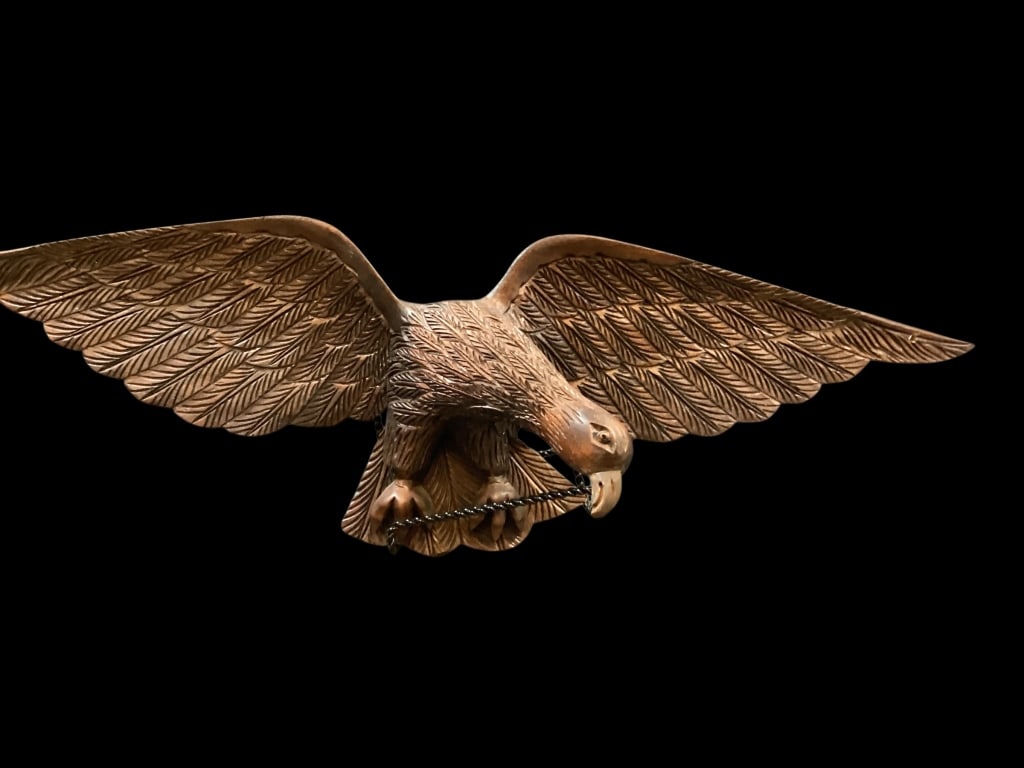 Hand Carved Wooden Eagle: Nicely executed wooden carving of Pilot House Eagle, 27 inches in length. Spread winged design with downward looking head, historically placed atop maritime pilot houses. Vintage with detailed