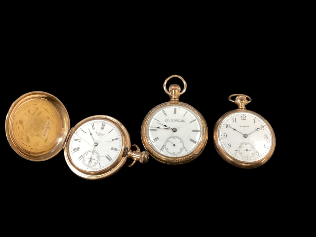 Three Vintage Pocket Watches: American Waltham #317279 Royal, gold tone or filled double case. Elgin Watch Company open face inside case marked facts Montauk#5739576. Waltham Wadsworth Pilot, open face, engraved back case,