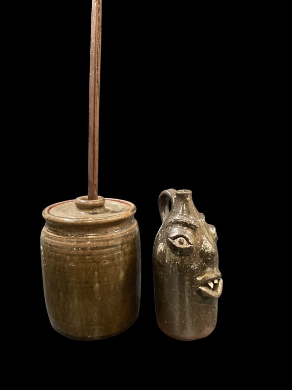 Southern Pottery Miniatures: Miniature Stoneware Churn jar, probably Catawba Valley, 5.5 x 4 inches, glossy dark glaze, with lid and dasher. 7 inch miniature Face Jug by Billy Wayne Hewitt, 2 teeth, bug eyes, busy brows, small lo