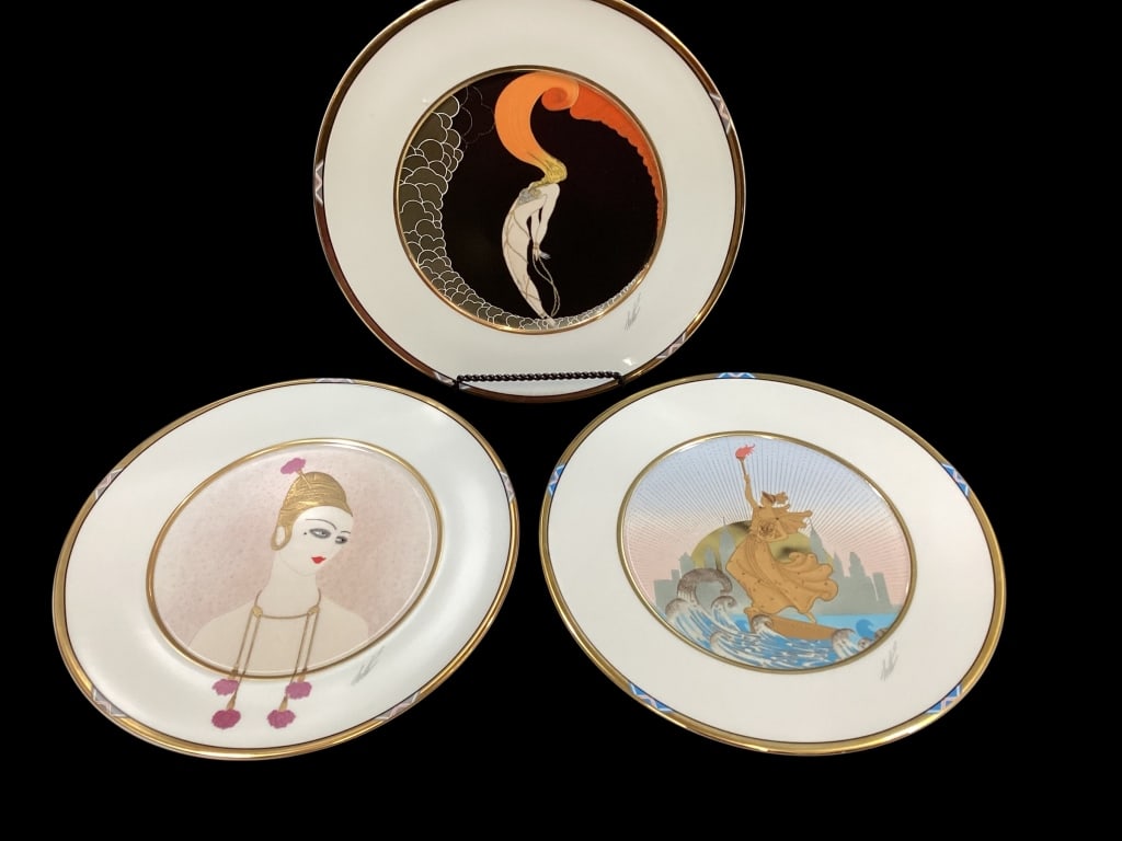 Three Erte Art Deco Collector Plates: Beautifully executed in bone China, produced in West Germany by Sevenarts Ltd. Charger size at 12.5 inches. Each signed and #. Includes Carnations, L?Amour, and Statue of Liberty