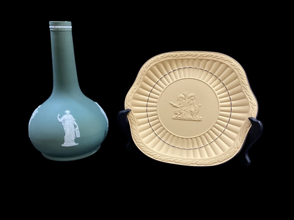 Wedgwood Plate, Vase: Yellow Cane and black Jasperware handled cake plate. Plate features 2 Bacchanalian Boys, designed in 1783. Sage Green decanter bottle, matte finish with classical white relief figures. 9 inches