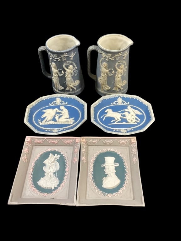 Six Porcelain Jasperware Articles: Pair German Schafer & Vader, portrait plaques, 4.5 inches , cameo relief figures in wreathed frame work. Pair Jasperware footed oval trinket dish trays in blue with Grecian scenes. 2 Jasperware