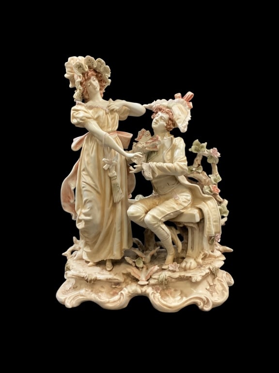 German Porcelain Figural: Karl Ens porcelain figures of a Romantic Wedding Proposal. 13 inches tall, with delicate muted colors, detailed figures, with florals, birds, budding tree branches.
