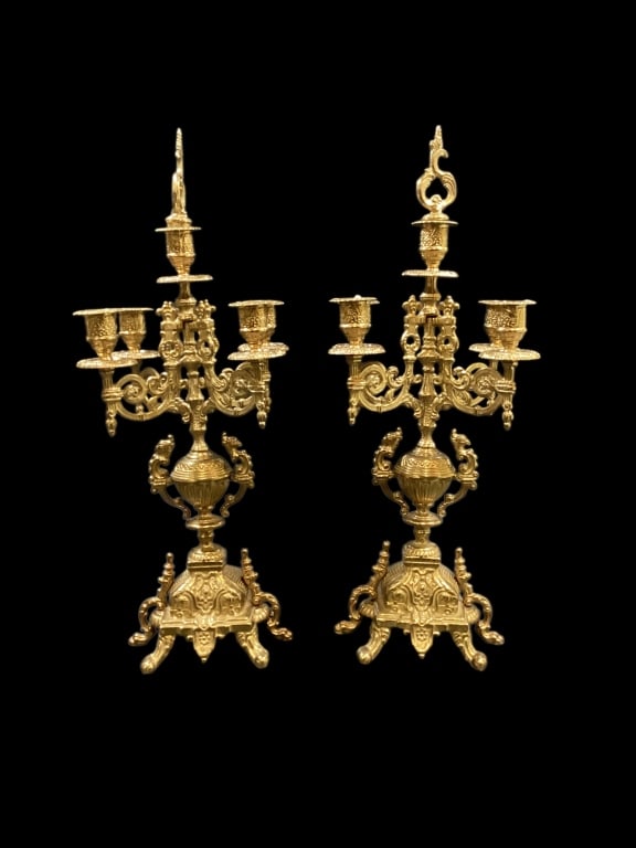 Pair Baroque Brass Candleabra: Highly Ornate Baroque Revival 5 light Candleabra. Scrolling motif with mythical beasts, decorative urns, rolled arms, and removeable finials