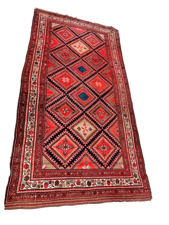 Antique Caucasian Shirvan Runner: Antique Caucasian Shirvan Runner features a classic geometric design with a series of stepped diamond medallions running the length of the central field. Hand-knotted with wool, the rug showcases