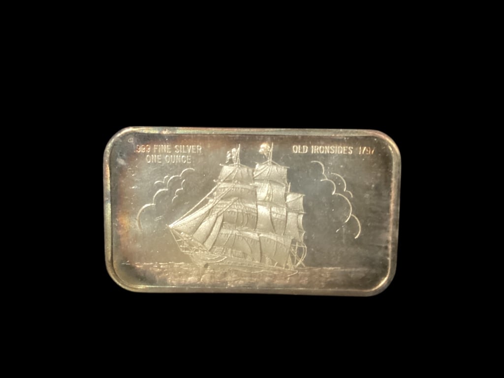 One Ounce Silver Bar: .999 fine silver bar, Old Ironsides, produced by Madison Mint. ( have not removed from frame for inspection).