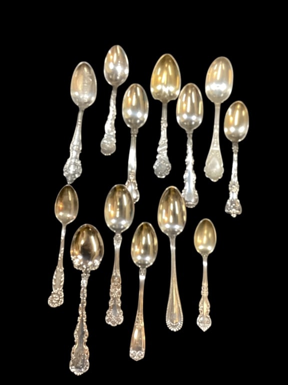 Sterling Silver Spoons: 13 pieces, varied makers and patterns, sizes 5 to 6 1/4 inches. 1 for St. Louis Worlds Fair. 9.07 ozt approximately