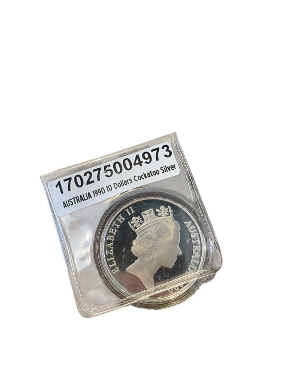 Australia 1990 10 Dollar Cockatoo Silver Coin: Australian 1990 $10 silver proof coin featuring a cockatoo in flight. Struck in silver.