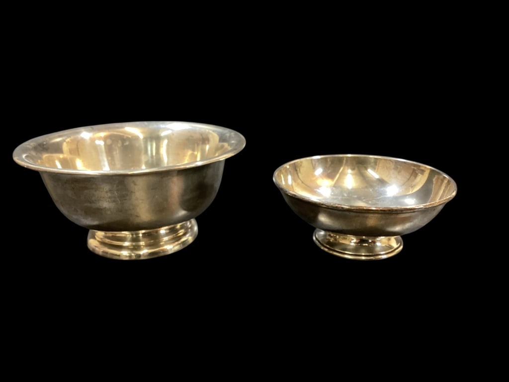 Two Sterling Silver Bowls: Revere Style Sterling Bowls, 5 and 6 inch diameter, footed forms. 7.89 ozt approximately.