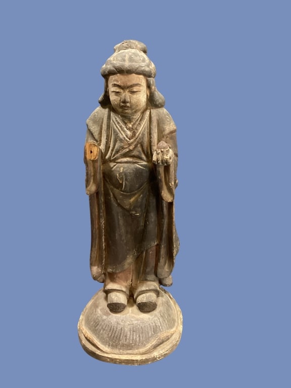 Japanese Shinto Diety: Wooden carved figure, portrays typical Buddhist deity, Serene expression holding a pomegranate in left hand. Attribution to Goddess of Good fortune. Patinated with age, missing right hand, 16 inches
