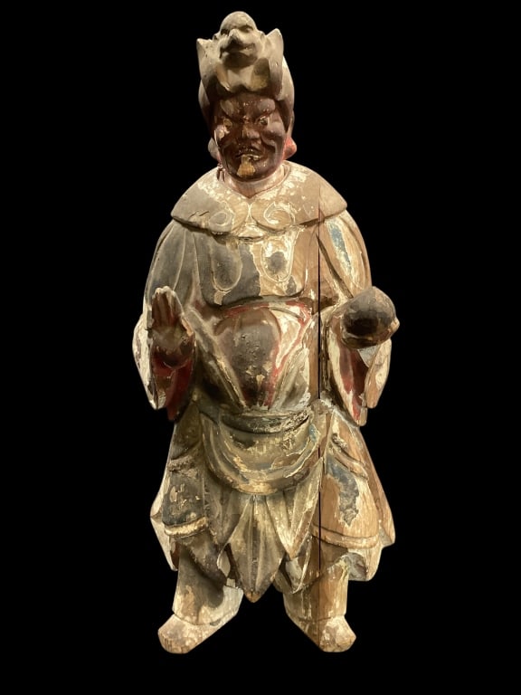 Japanese Fudo Figure: Depicting a carved Figural of fudo god with angry face. Polychrome remnants one hand holding pomegranate with right hand in extending pose18 th century figure* age wear, crack to body - ()