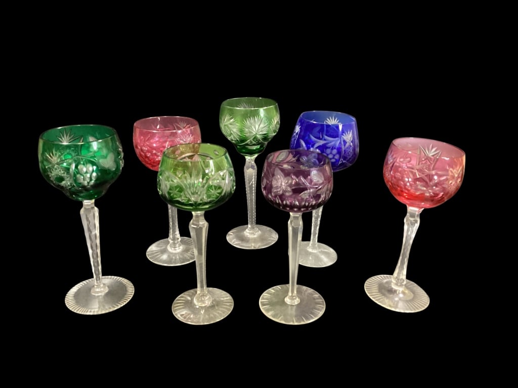 Bohemian Crystal Stems: Seven vintage Bohemian cut to clear stems, with vibrant colors, decorative cuts in various patterns. Not a matched set, but complimentary as a group 7.5 and 8 inches tall Line Item # 79 - ()