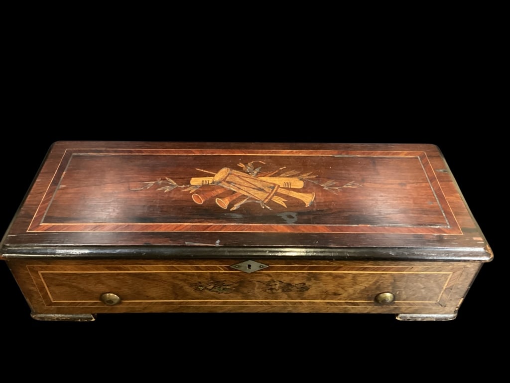 Swiss Music Box: Attribution to Jacob Music Box Company, wooden cased cylinder player, with lift lid, interior glass case top.with hand crank operation, safety check, stop play switch. Nice inlaid case, 22 x 8 x 5