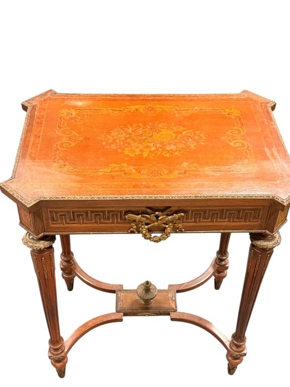 Antique French Marquetry Inlaid Vanity Work Table: Antique French Louis XVI style marquetry vanity or work table featuring a lift-top lid. The exterior top is meticulously decorated with an elaborate floral bouquet and scrollwork marquetry inlay